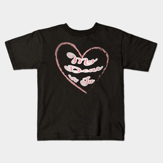 My dear is in, red letters with a white border in a red heart, a declaration of love on Valentine's Day Kids T-Shirt by PopArtyParty